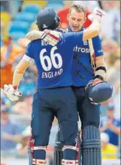  ?? AP PHOTO ?? England's Alex Hales (right) is embraced by teammate Joe Root after scoring a century.