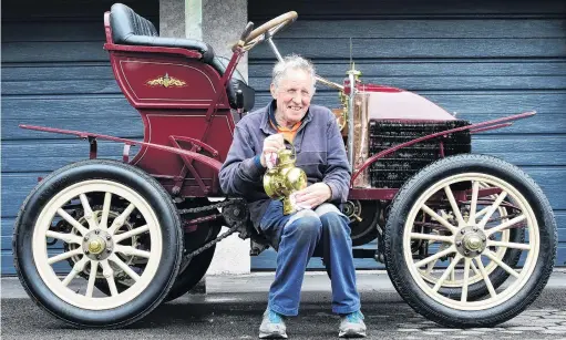  ?? PHOTO: GREGOR RICHARDSON ?? Some light work . . . Colin Winter polishes a lantern from his 1900 Wolseley (nicknamed Grandma), in preparatio­n for the National Veteran Car Rally in Gore this weekend.