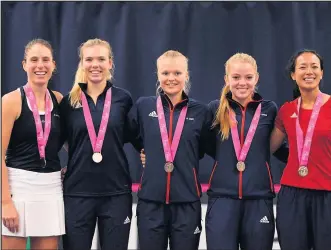  ??  ?? Johanna Konta, Katie Boulter, Harriet Dart, Katie Swan and Anne Keothavong of Great Britain pose with their medals after winning during Day Four of the Fed Cup Europe and Africa Zone Group I at the University of Bath. (Photo by Harry Trump/Getty Images for LTA)