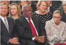  ?? BRENDAN SMIALOWSKI/AFP/GETTY IMAGES ?? Chief Justice John Roberts (left) and Justices Clarence Thomas and Ruth Bader Ginsburg at the Kavanaugh ceremony.