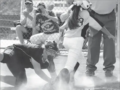  ??  ?? LaFayette Middle School pitcher Madison Pettigrew tries to make a tag at home in last Monday’s game against Calhoun. The runner was safe on the play, but the Lady Ramblers rallied for a 10-9 win. (Messenger photo/Scott Herpst)