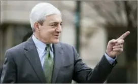  ?? MATT ROURKE — THE ASSOCIATED PRESS ?? Former Penn State president Graham Spanier gestures as he walks from the Dauphin County Courthouse in Harrisburg Friday.