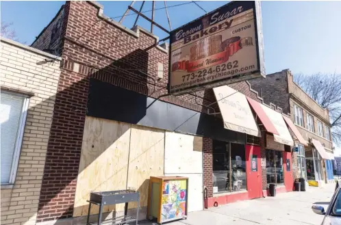  ?? ANTHONY VAZQUEZ/SUN-TIMES ?? A car crashed into Brown Sugar Bakery, 328 E. 75th St., in Park Manor.