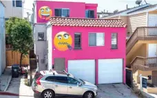  ?? — AFP ?? View of the pink emoji house that has become embroiled in a feud between neighbors in Manhatten Beach, California.