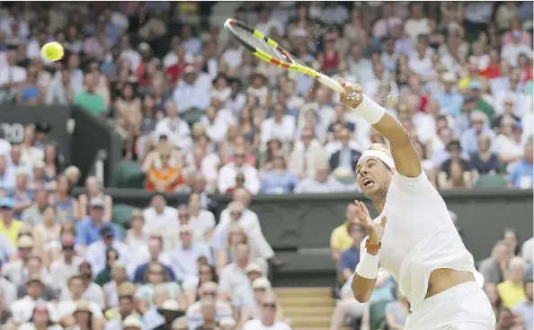  ?? TIM IRELAND/THE ASSOCIATED PRESS ?? Spain’s Rafael Nadal cranks a forehand at the Czech Republic’s Jiri Vesely during a fourth-round singles match at Wimbledon on Monday in London. Nadal won 6-3, 6-3, 6-4 and will face either No. 5 Juan Martin del Potro or Gilles Simon in the...