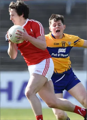  ??  ?? Eoghan Lafferty of Louth in action against Conor Finucane of Clare on Sunday.