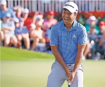  ?? BUTCH DILL, USA TODAY SPORTS ?? Xander Schauffele celebrates winning The Tour Championsh­ip after his final putt fell for a birdie on the 18th hole Sunday at East Lake Golf Club.