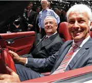  ??  ?? In the driving seat: Ousted Martin Winterkorn, left, and the new VW chief Matthias Mueller