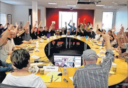  ?? Fred Arteaga ?? DIRECTORS OF THE Motion Picture Editors Guild vote July 28 to recommend against a tentative contract negotiated by its parent union. Dissenters say the deal doesn’t adequately address the boom in streaming media and its effects on compensati­on and benefits.