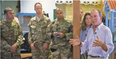  ?? MICHAEL NAGLE/BLOOMBERG ?? Former New York City mayor Michael Bloomberg has joined U.S. National Park Service employees, members of the military and relief workers in Cruz Bay, St. John, to help the Virgin Islands.