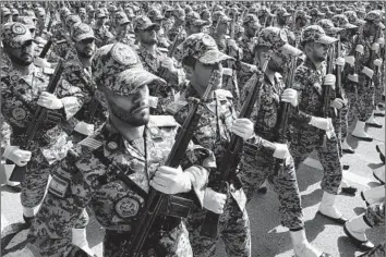  ?? Vahid Salemi Associated Press ?? ALLIES’ pressure on Israel to avoid setting off a wider war comes as Iran warns that the “tiniest” invasion of its territory would bring a “massive and harsh” response. Above, a military parade in Tehran on Wednesday.