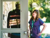  ?? MATT ROURKE/AP ?? Amanda Kifferly, vice president for abortion access at The Women’s Centers, speaks Wednesday with a security guard at their location in Cherry Hill, N.J.