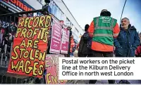  ?? ?? Postal workers on the picket line at the Kilburn Delivery Office in north west London