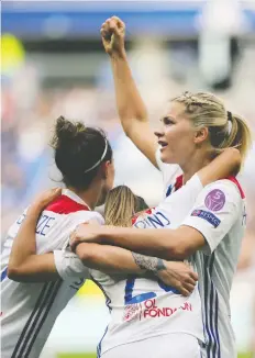  ?? AP/FILES ?? Lyon’s Delphine Cascarino celebrates after scoring against Chelsea during a Women’s Champions League match earlier this month. UEFA launched its five-year developmen­t plan for women’s soccer on Friday.