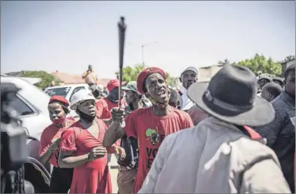  ?? Photo: Marco Longari/afp ?? Standoff: Economic Freedom Fighters members and farmers confront each other in Senekal, Free State, after a farm manager was murdered at the beginning of this month.