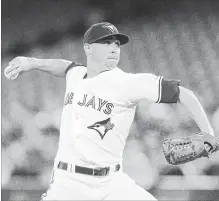 ?? FRED THORNHILL THE CANADIAN PRESS ?? Toronto Blue Jays starting pitcher Aaron Sanchez throws during the first inning of Friday’s American League MLB baseball game against the New York Yankees in Toronto.