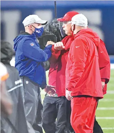  ?? AP PHOTO/ADRIAN KRAUS ?? Head coaches Andy Reid of the Kansas City Chiefs, right, and Sean McDermott of the Buffalo Bills greet each other after their Oct. 19 game in Orchard Park, N.Y. The Chiefs beat the Bills 26-17.