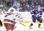 ?? Chris O'Meara / Associated Press ?? Rangers goalie Henrik Lundqvist makes a blocker save on a shot during the second period against the Lightning Thursday in Tampa, Fla.