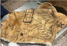  ?? Dubai Customs ?? An animal skin covered with symbols was among the items found in the traveller’s luggage, said Dubai Customs