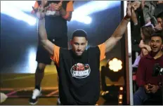  ?? PHOTO BY CHRIS PIZZELLO — INVISION — AP ?? Ben Simmons comes out to participat­e in a challenge at the Kids’ Choice Sports Awards on Thursday in Santa Monica, Calif. Tobias Harris said he’s seen the new and improved Simmons jump shot this summer.