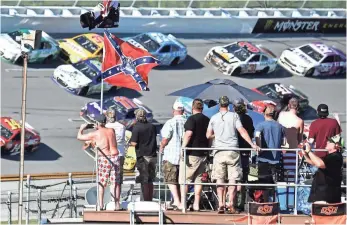  ?? ADAM HAGY, USA TODAY SPORTS ?? The Confederat­e flag flew in the infield at the May 7 Monster Energy NASCAR Cup Series race at Talladega Superspeed­way in Alabama.