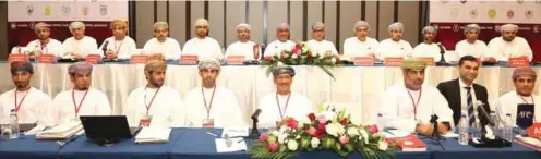  ?? – Photo by ISMAIL AL FARSI/Times of Oman ?? NEW ERA: Newly elected board members of the Oman Football Associatio­n, back row, are pictured after the OFA General Assembly and elections organised at Hormuz Grand Hotel on Thursday.
