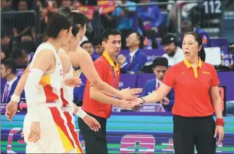  ?? XINHUA ?? Team China head coach Zheng Wei, pictured at the Hangzhou Asian Games last October, says her players will need to level up their physicalit­y on the Olympic court in Paris.