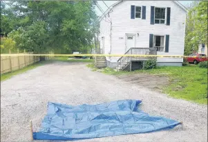  ?? SHARON MONTGOMERY-DUPE/CAPE BRETON POST ?? The crime scene at 2200 Sydney Road in Reserve Mines, in this file photo taken Thursday, June 25, 2015.