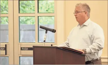 ?? Adam Cook ?? Former Catoosa County EMA and 911 Director Dennis Thayer presents his claims of unwarrante­d terminatio­n during the April 16 Board of Commission­er’s meeting.