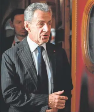  ?? // AFP ?? El expresiden­te Sarkozy, ayer tras conocer la nueva sentencia