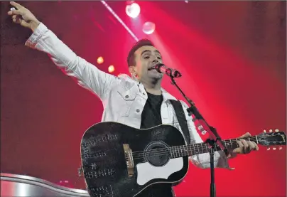  ?? DESIREE ANSTEY/ JOURNAL PIONEER ?? Jacob Hoggard, lead singer of the rock band, Hedley, performs Saturday night on stage in Summerside.