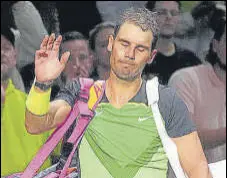  ?? AP ?? A dejected Rafael Nadal, playing his first singles match since the US Open, walks off after losing to Tommy Paul at Paris Masters.