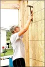  ?? LYNN KUTTER ENTERPRISE-LEADER ?? Above: Lyndon Miller, 18, a senior at Lincoln High School, helps to build a home for a couple in Washington County. The couple lost their home during the April floods. Above, center: Prairie Grove Christian Church is helping to build a new home for...