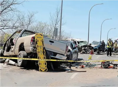  ?? MATTHEW P. BARKER EXAMINER ?? Six vehicles were damaged after being struck Monday afternoon on Lansdowne Street East at the bridge over the Trent-Severn Waterway west of River Road. At least one person died and four others were injured.