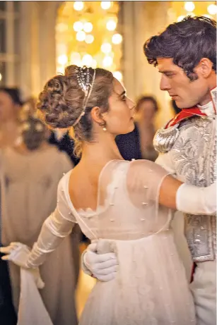  ??  ?? Having a ball: James Norton and Lily James starred in