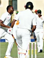  ??  ?? Zimbabwe‘s Michael Chinouya celebrates after dismissing New Zealand’s Ish Sodhi in the third-day of the first cricket Test at Queens Sports Club in Bulawayo yesterday