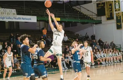  ?? SHARON MERKEL/PHOTOS SPECIAL TO THE MORNING CALL ?? Allentown Central Catholic’s David Fridia attempts a shot in the rematch of last year’s Eastern Pennsylvan­ia Conference championsh­ip game against Pocono Mountain West on Friday.