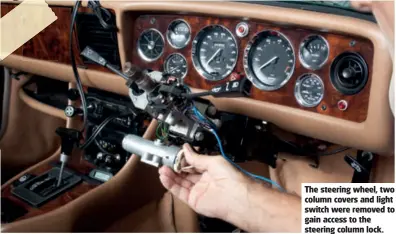  ??  ?? The steering wheel, two column covers and light switch were removed to gain access to the steering column lock.