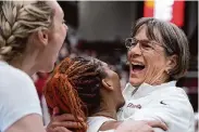  ?? Tony Avelar/Associated Press ?? Stanford coach Tara VanDerveer, right, celebrates with Kiki Iriafen, center, and Cameron Brink after tying former Duke men’s coach Mike Krzyzewski for the most victories in NCAA history.