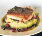  ??  ?? The crispy-skin salmon comes on top of Swiss chard and corn polenta. Superlativ­e: Very good: Promising: