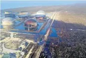  ?? RAMON ESPINOSA/AP ?? Aerial view of damage at Equinor’s South Riding Point oil storage facility in the aftermath of Hurricane Dorian.