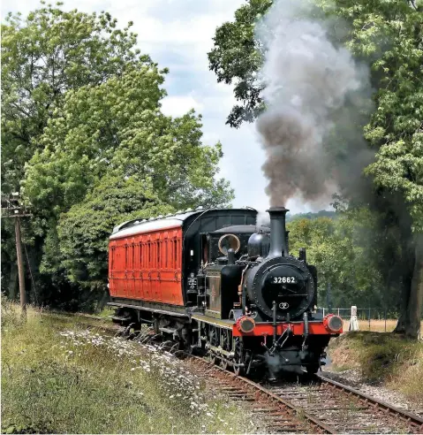  ??  ?? Horsted Keynes on the Bluebell Railway is another station recognised for its depiction of a typical Southern country byway. LBSCR Billinton ‘E4’ No. 32473(Birch Grove to most) completes the Brighton-style scene on April 28 2008.