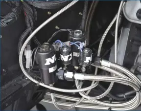  ??  ??  A dual-stage nitrous system from Nitrous Express can add around 500 extra horsepower if need be. There are two small solenoids (one of which is used for spooling) and then two large solenoids that do the majority of the power-adding.