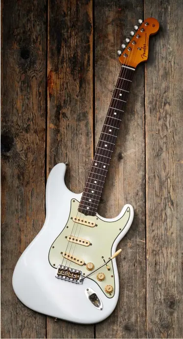  ??  ?? Nev Marten’s heavily modded Classic Player Strat, originally Sunburst, looks a treat – but basic home modding can’t change fundamenta­ls such as neck profile and wood quality