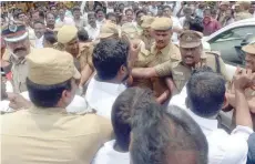  ?? — AFP ?? DMK activists and opposition groups clash with police during a protest against the killings of protesters in Tuticorin, during a protest in Chennai.