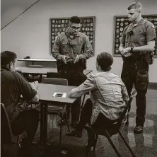  ?? Josie Norris / Staff photograph­er ?? San Antonio Police Academy cadets Jose Bernal, left, and Anthony Bellm, participat­e in a role playing exercise last year.