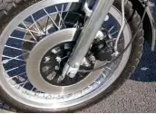  ??  ?? Twin front discs with very simple calipers, and alloy rims too. Yamaha knew how to spoil their customers