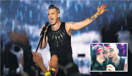  ?? PHOTOS: CRAIG BAXTER/SUPPLIED ?? Let me entertain you . . . Robbie Williams rocks the 16,000strong crowd at Forsyth Barr Stadium in Dunedin on Saturday night. Inset: Dunedin Robbie Williams fan Manda Hall (26) on stage with her idol.