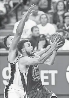  ?? TROY TAORMINA, USA TODAY SPORTS ?? Stephen Curry, right, is averaging 28.6 points per game in the postseason for the Warriors.