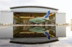  ??  ?? The No. 1 Belugaxl, the first structural­ly complete new super transporte­r by Airbus, is seen behind the No. 2 Belugaxl, undergoing its own integratio­n process in an assembly hangar.